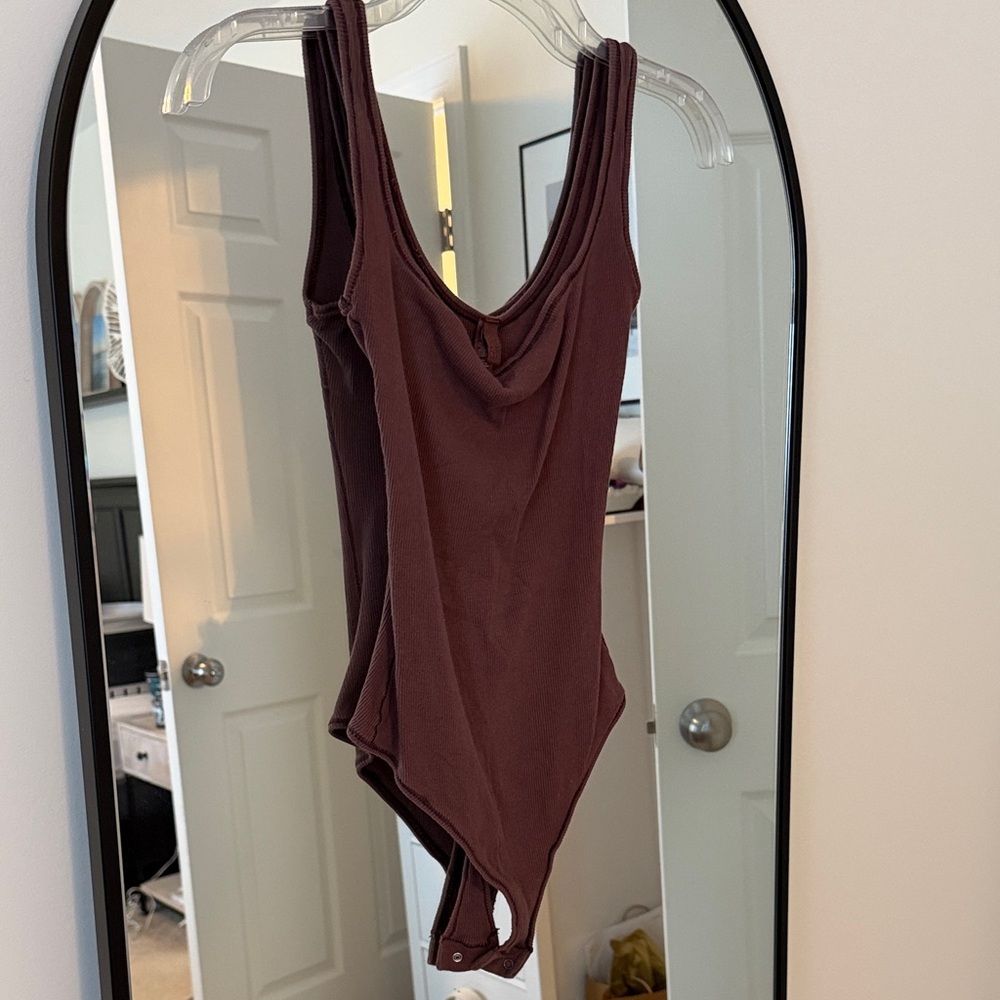 SKIMS Sleeveless Scoop Neck Bodysuit in Deep Brown